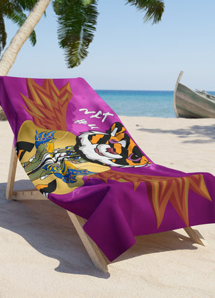 Soft purple beach towel on sand